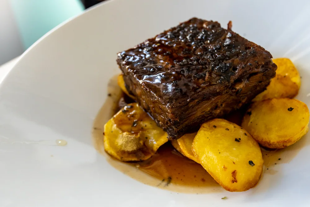 Braised Oxtail with Potato Gratin and Roasted Vegetables