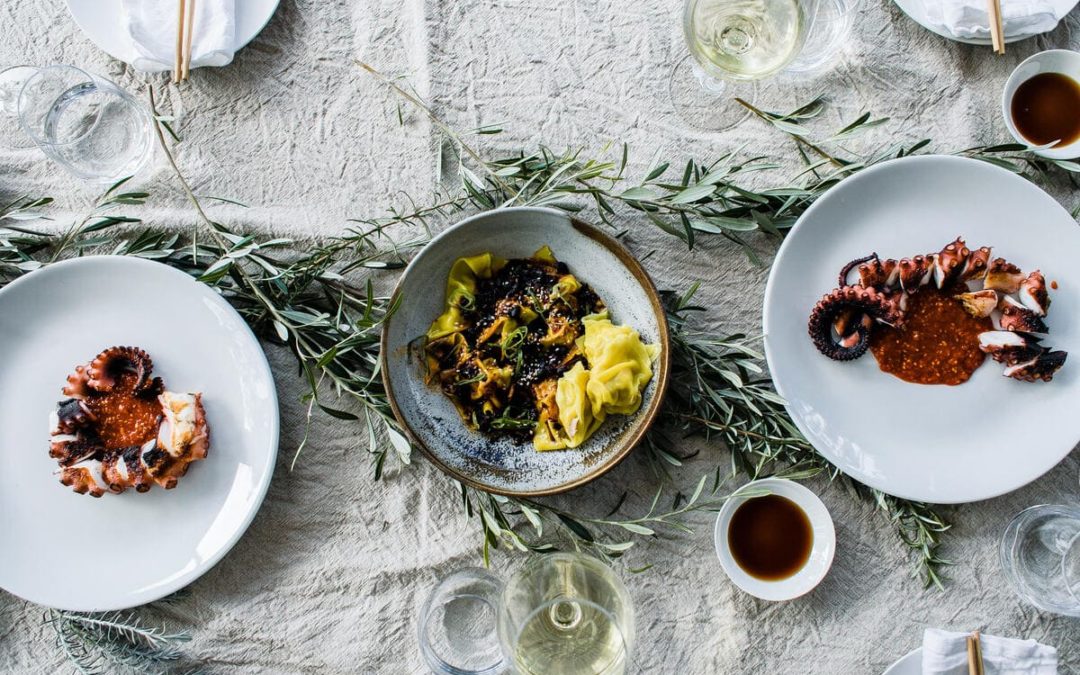 table with plates of food