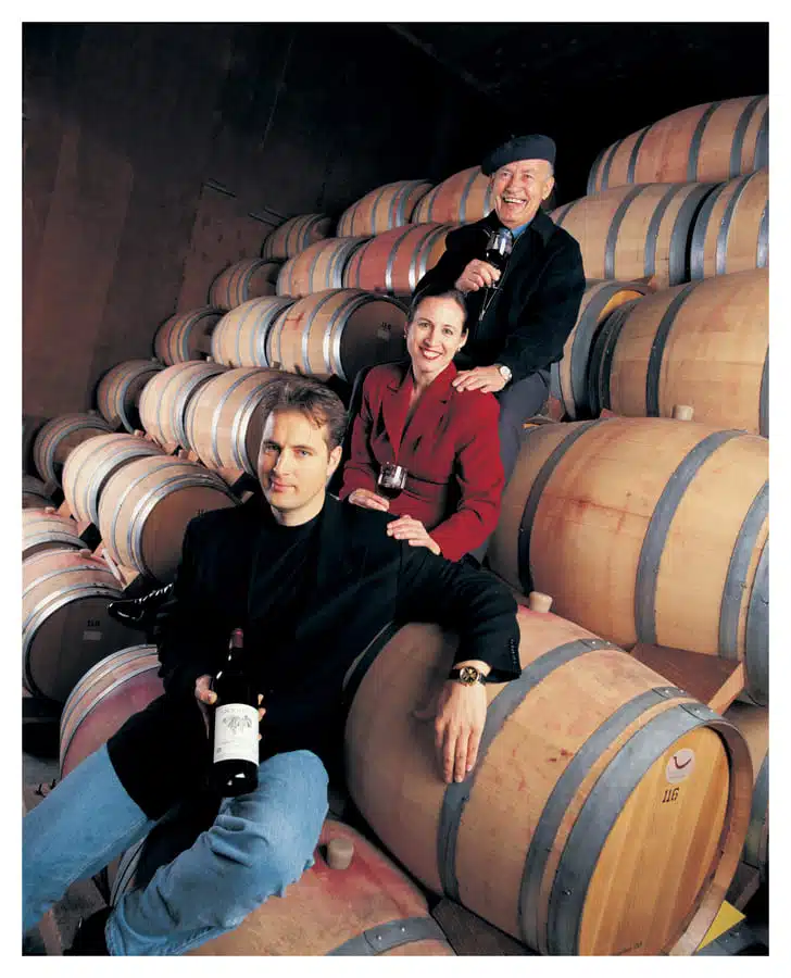 09-23 a life full of miracles pt 2 4 mike and family sitting on wine barrels