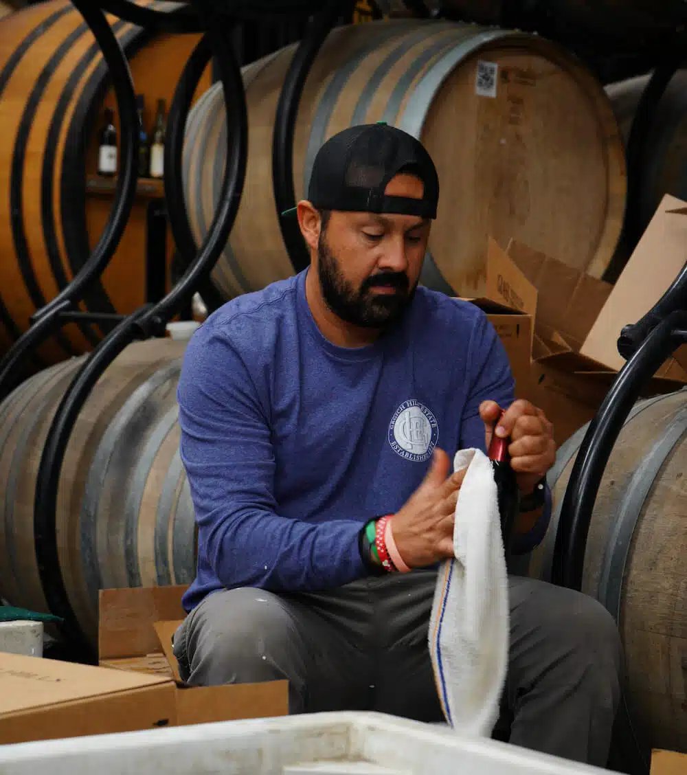 JuanSalomon1 juan cleaning bottles