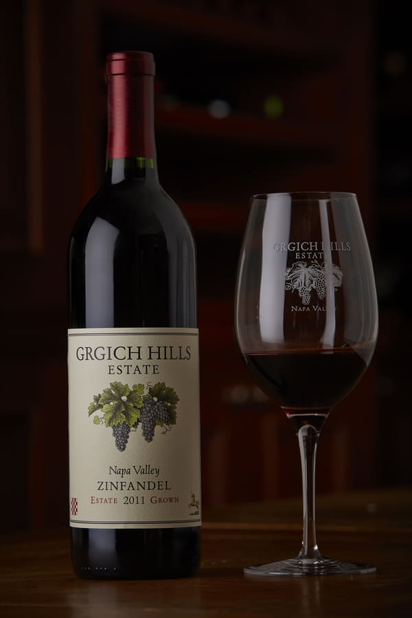 12-23 seasonal sip Zinfandel (1) wine glass and wine bottle