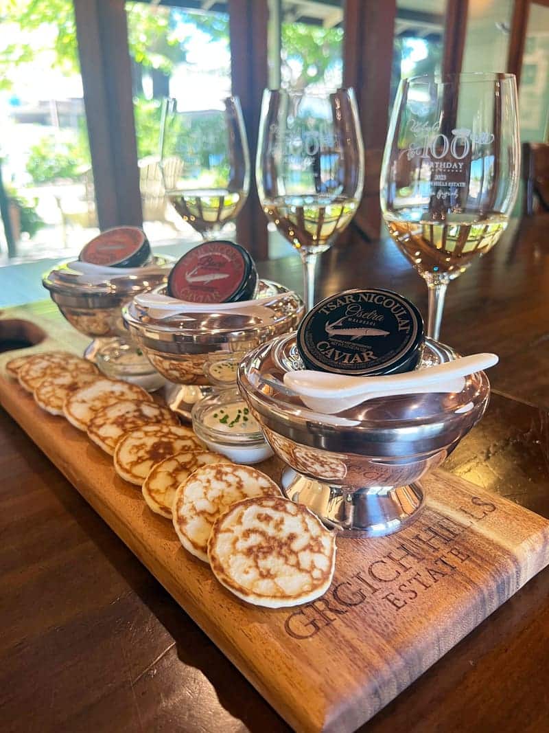 Wine glasses and food on a table